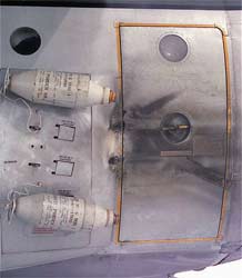 the left side of the aircraft showing where 2 JATO bottles broke off