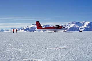 Twin Otter on deck on wheels on the Mill Glacier