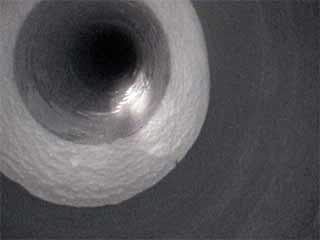 Looking down one of the boreholes