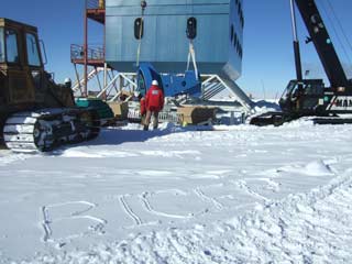 lifting the telescope mount into the building