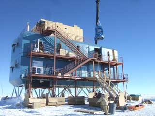 lifting the telescope mount into the building