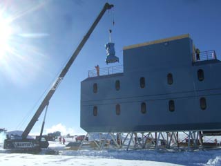 lifting the telescope mount into the building