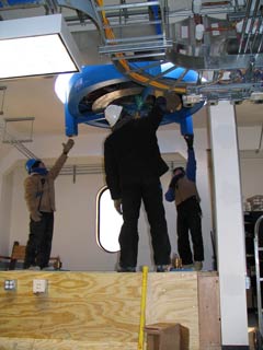 lowering the mount through the roof opening