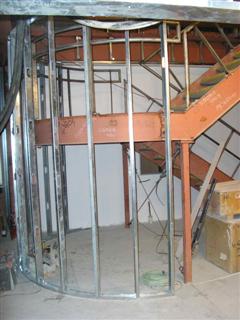 a turn for the top constructing the curved stairwell wall