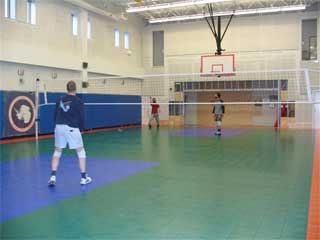 spike it Robert Polies play volleyball on the new gym floor