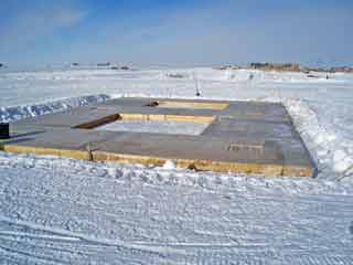 the foundation timber pads in place