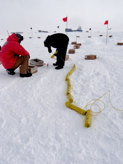 preparing dynamite charges to collapse Old Pole
