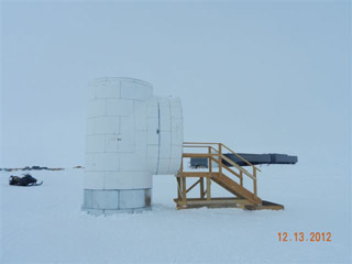 view of egress access with station in background