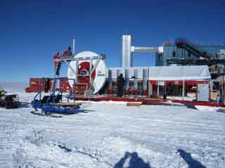 installing the hose reel on the sled with the snow melters