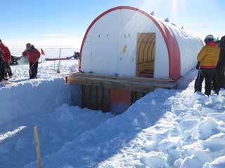 moving the tent over the drill trench