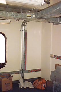 the southeast corner of the large room in the northeast corner of the second floor