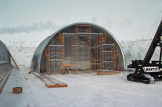 the hole-in-the-wall gang shows up new arch erection