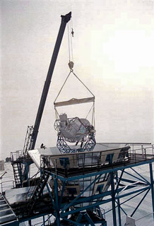 lowering the instrument into the mount