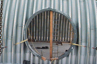 a hole in one! access for connecting passageway tubes
