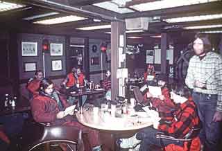 in the galley after the last flight, we're reading our mail