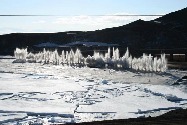 blasting the ice pier away from the shore