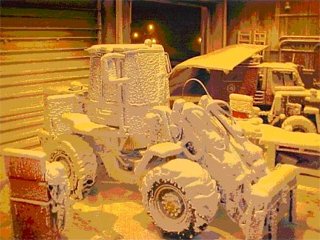 snow covered forklift in the VMF