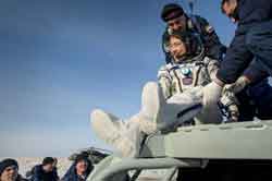 Christina returns to earth