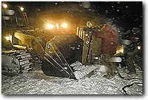 Using a front-end loader to recover medical supplies and equipment
