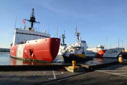 Polar Star being escorted from its Seattle pier by tugboat Westrac
