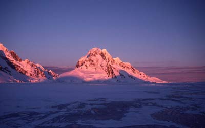 early morning sunrise lighting up the mountains