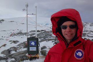Gregory Roberts in front of the instrument package