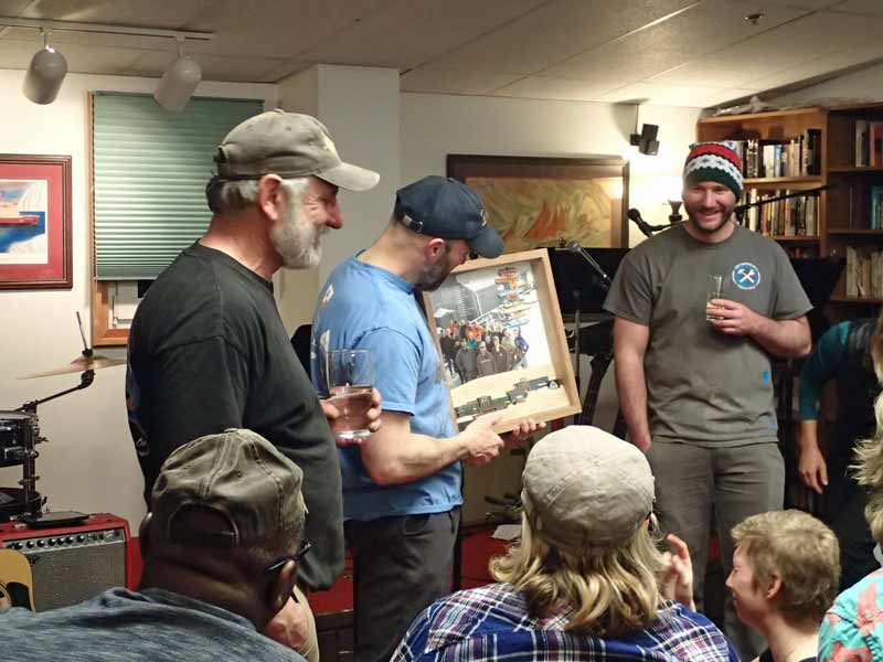 Palmer folks looking at the finished framed photo