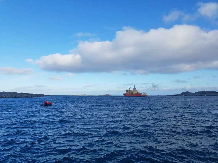 a Zodiac heading to Palmer Station from the Nathaniel B. Palmer