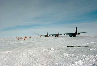 3 Hercs parked due to bad weather at McMurdo