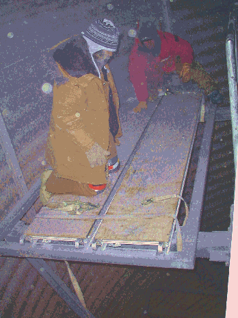 scaffold on top of support for vertical piping