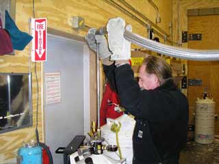 Mike holding the transfer hose