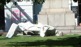 Scott resting on the grass after the earthquake