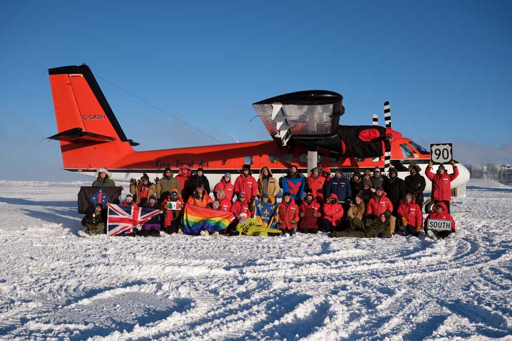 winterovers in front of the Twin Otter