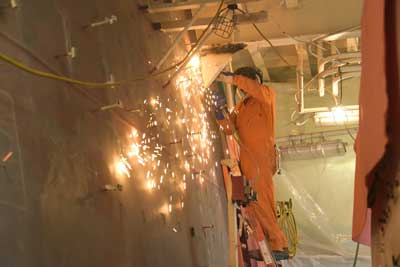 cutting a hole in the hull