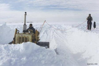 digging out a ramp to pull out the Herc