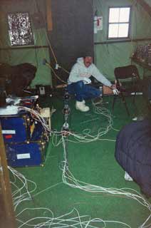 Bob Morse on the floor untangling things