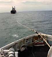 The Green Wave under tow as seen from the Polar Star