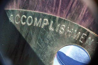 accomplishment, part of motto