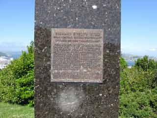 the plaque on the side of the statue