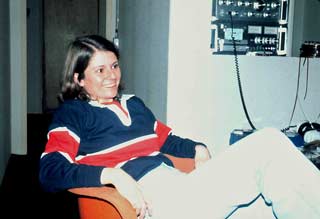 Michele Raney listening to music in the bar