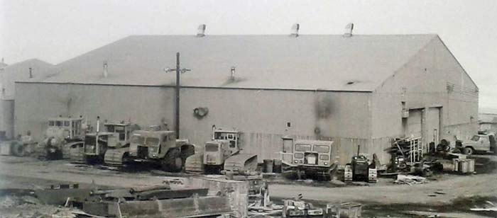 the uphill side of the shop