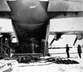 loading fuel drums for a flight to Byrd