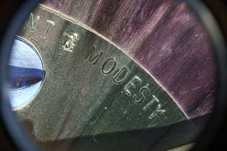 modesty, part of motto