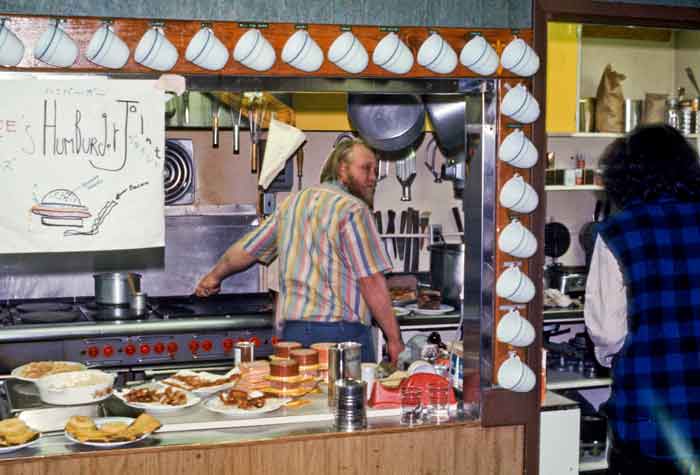 Lee cooking up Kiwi Burgers!